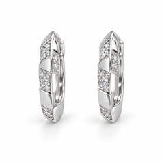 Faceted silver-tone hoop earrings with alternating polished segments and white-stone panels on a white background.