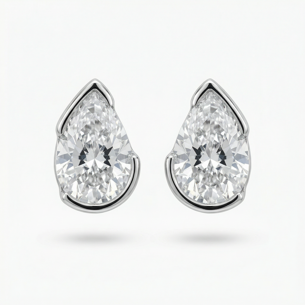 Duality Earrings with White Pear Stone – on White Gold