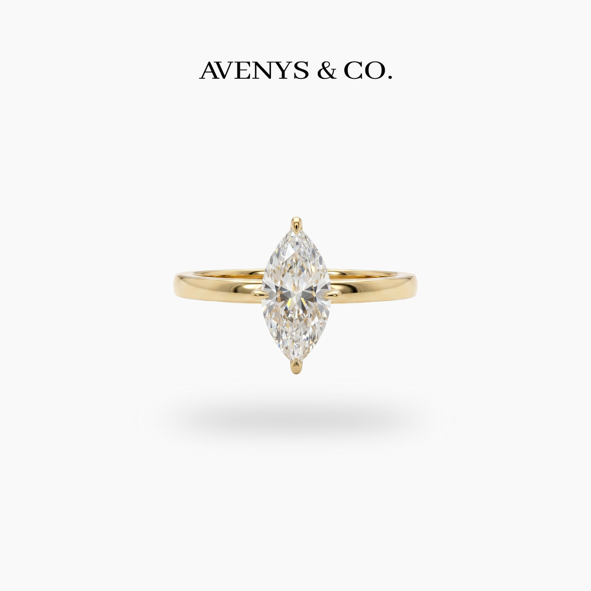 Marquis Solitaire Ring with White Marquise Stone – on Yellow Gold