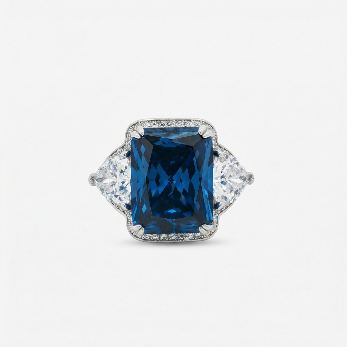 Queens Radiant Ring with Blue Round Stone – on White Gold