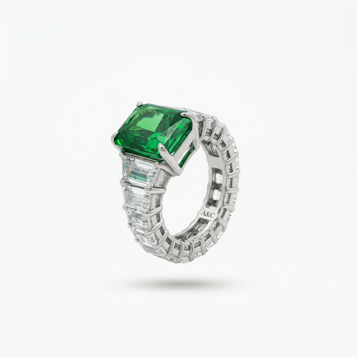 Princess Eternity Ring with Green Radiant Stone – on White Gold