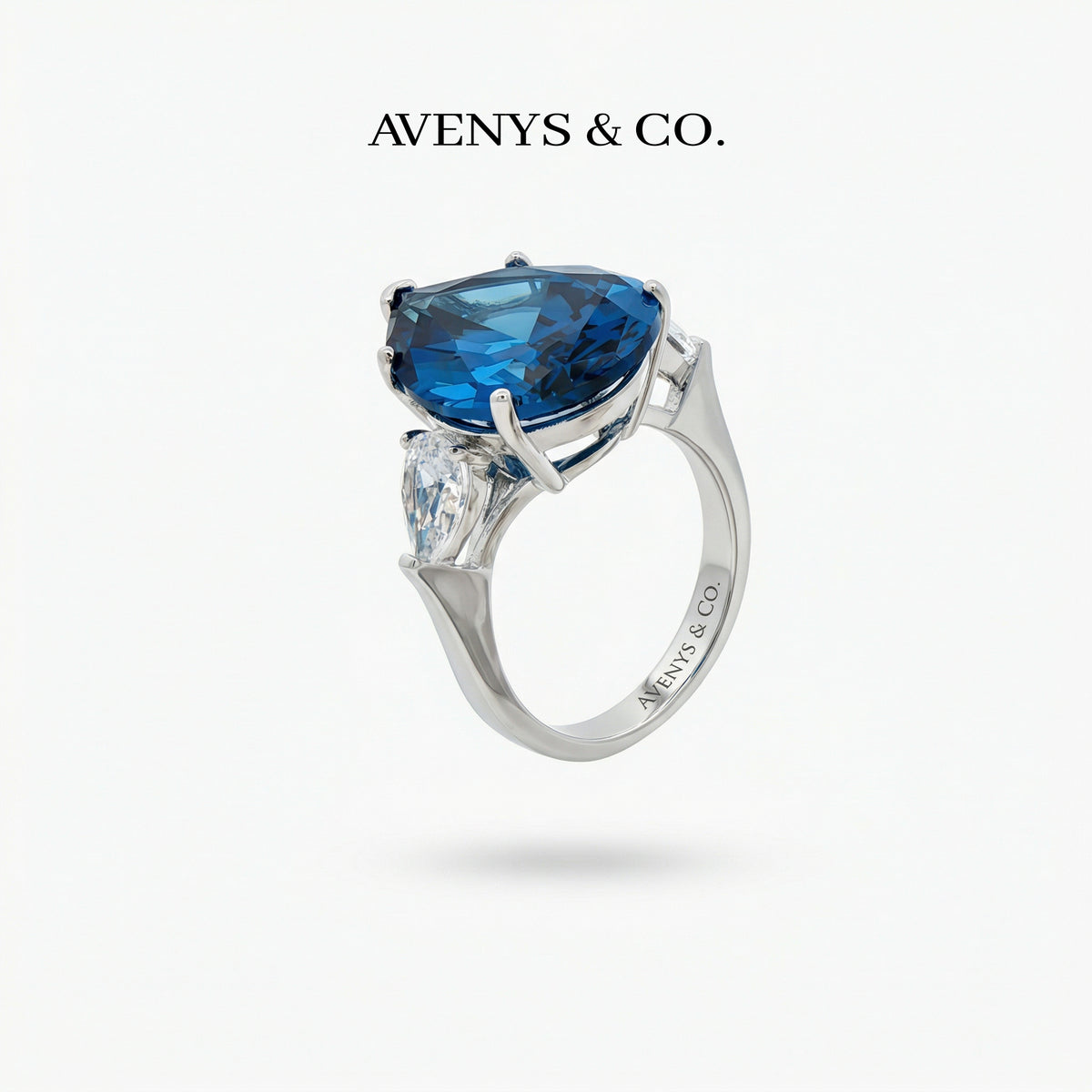 Pear Trilogy Ring with Blue Pear Stone – on White Gold
