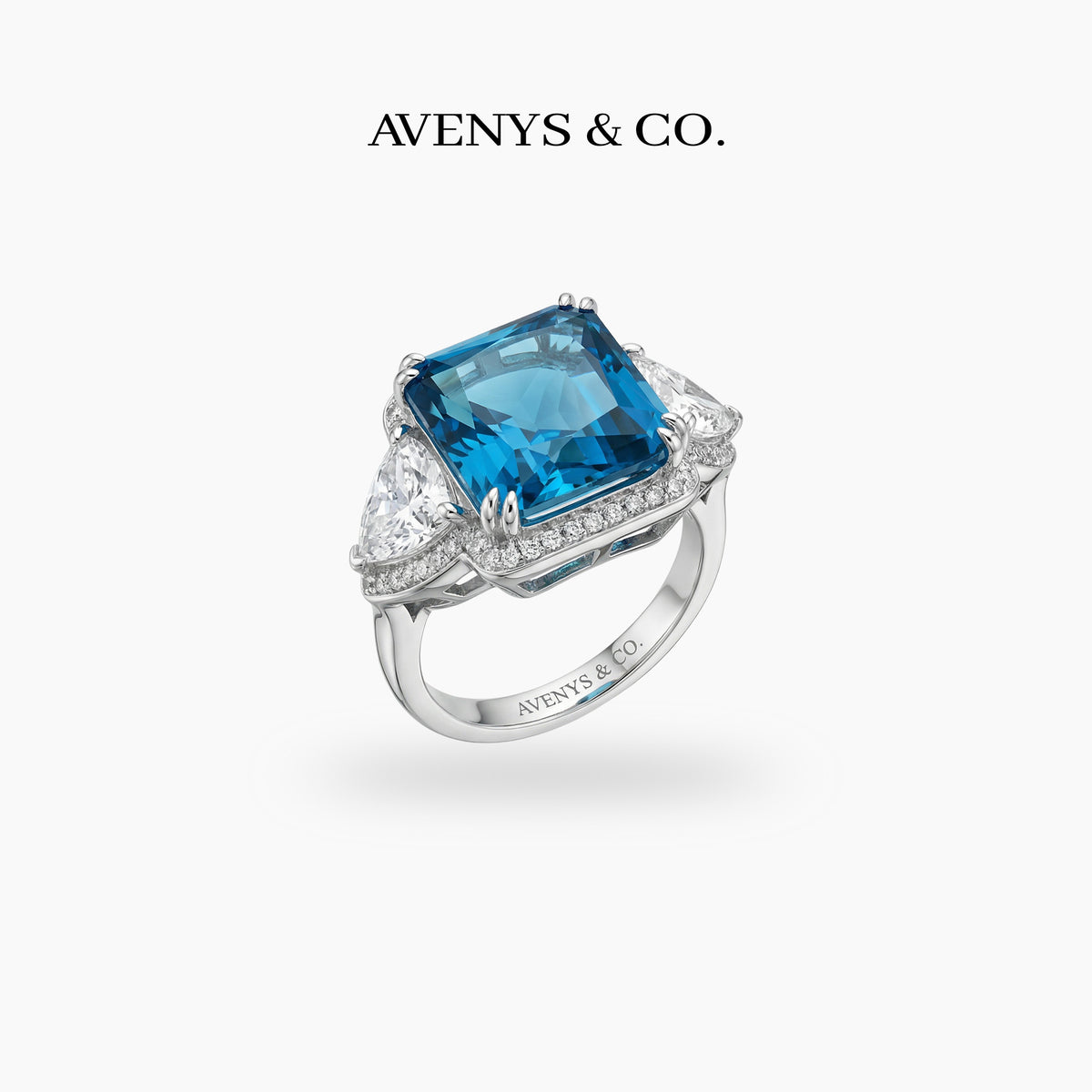 Queens Radiant Ring with Blue Round Stone – on White Gold