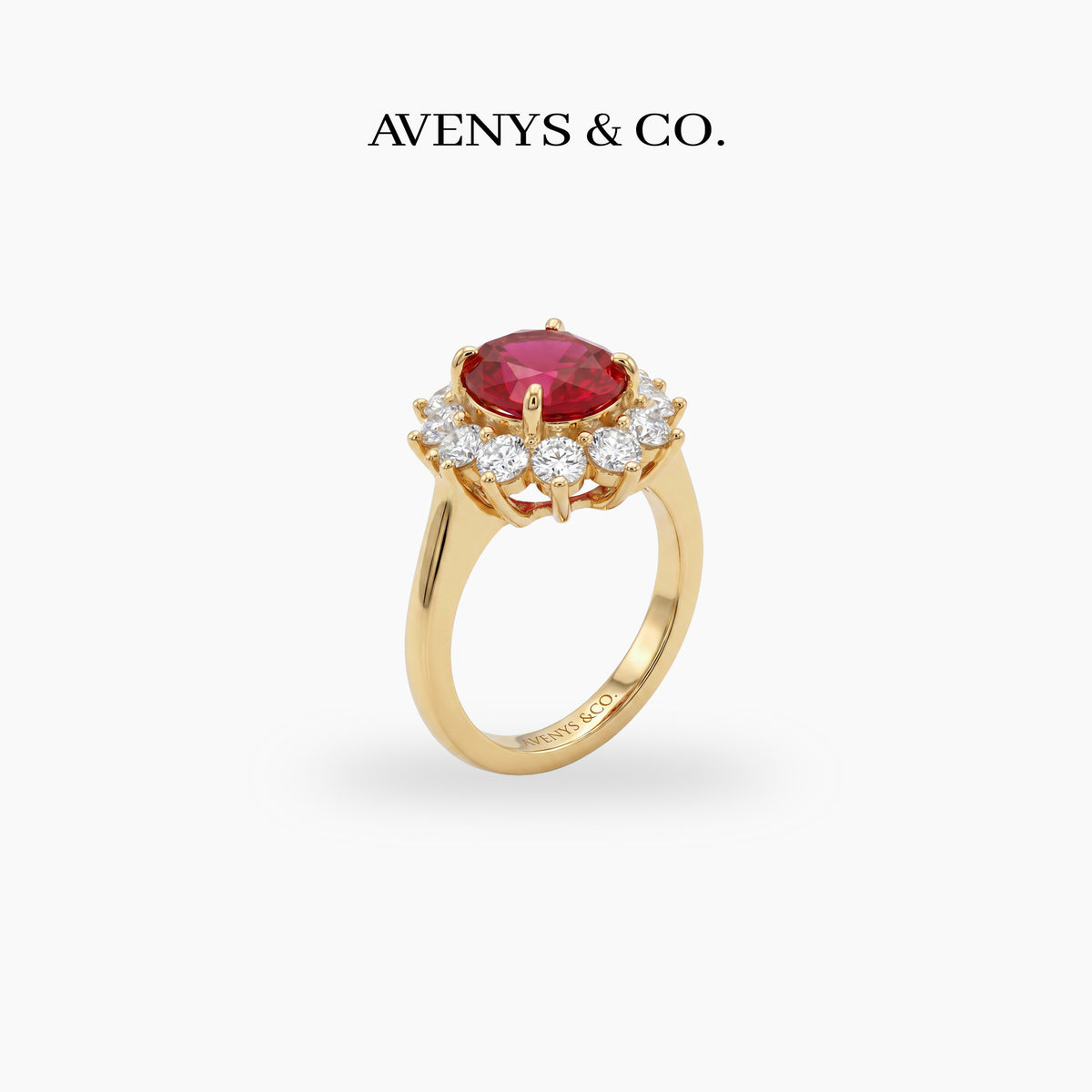 Classic Halo Ring with Red Oval Stone – on Yellow Gold