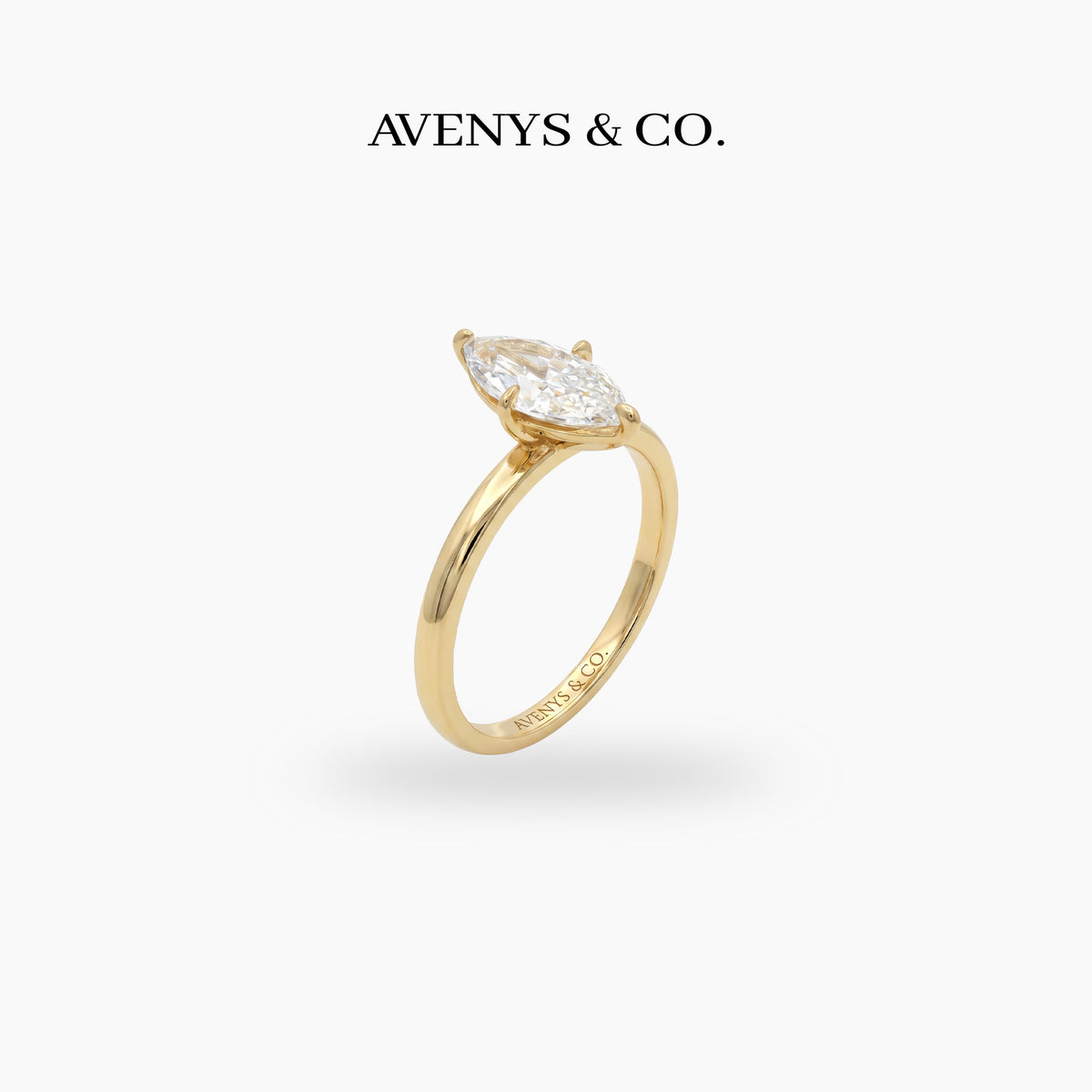 Marquis Solitaire Ring with White Marquise Stone – on Yellow Gold
