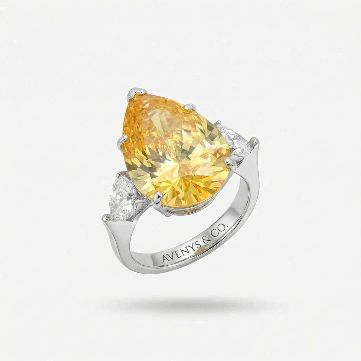 Pear Trilogy Ring with Yellow Pear Stone – on White Gold