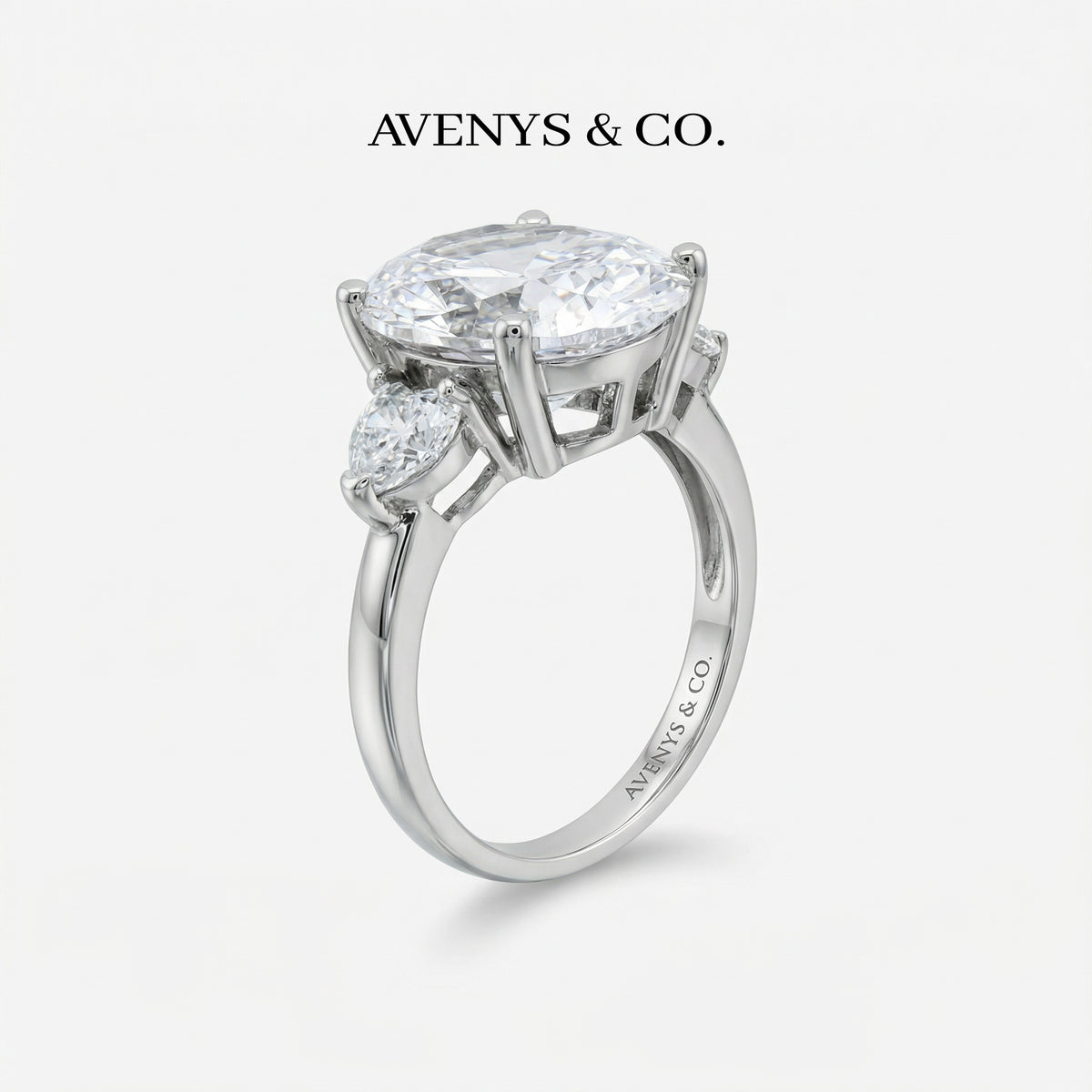 Oval Trilogy Pear Ring with White Oval Stone – on White Gold