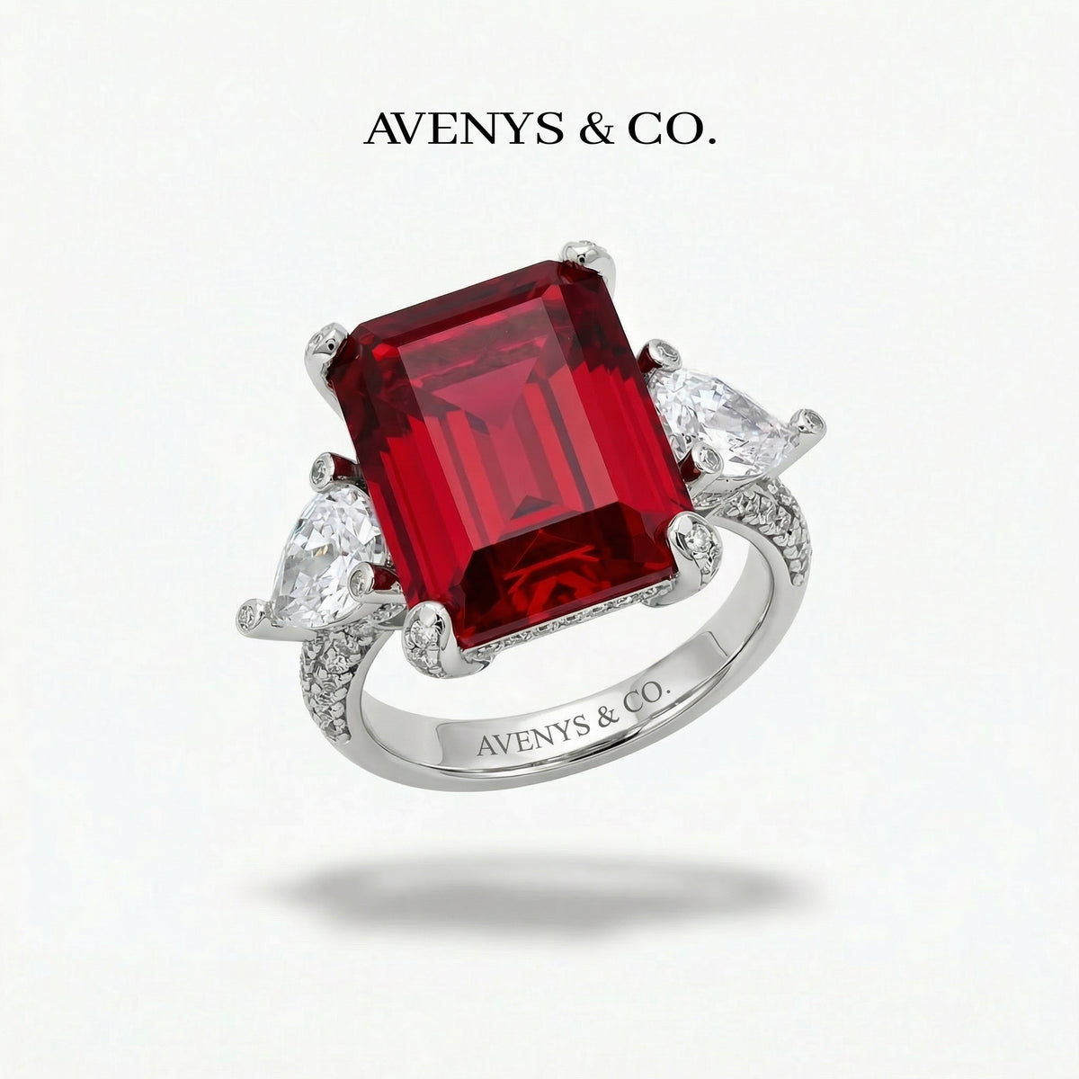 Emerald Pear Trilogy Ring with Red Emerald Stone – on White Gold
