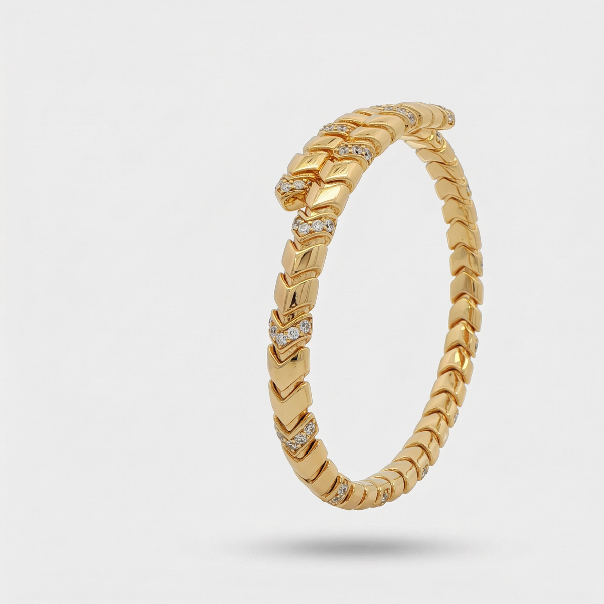 Chevron  Bangle with White Round Stone – on Yellow Gold