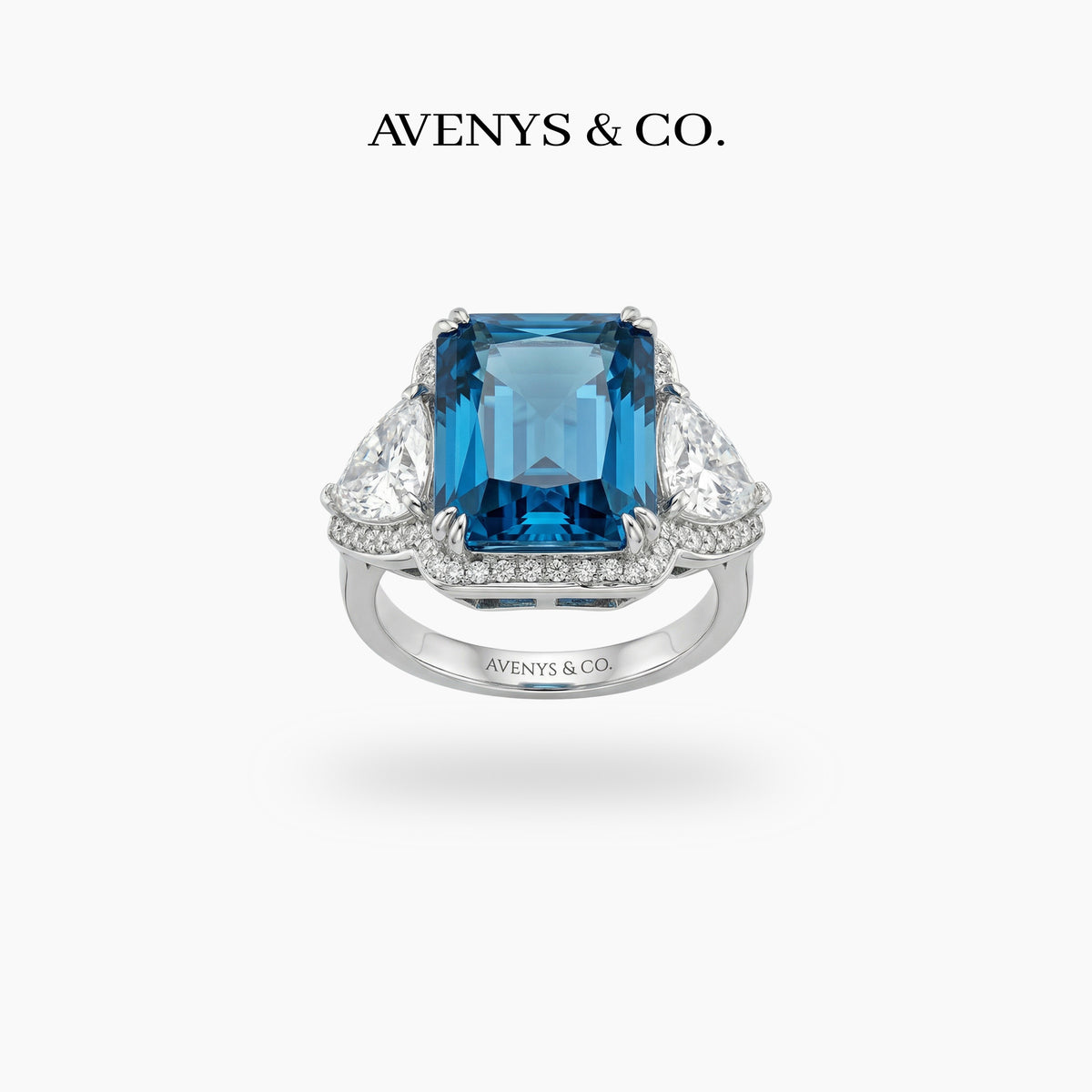 Queens Radiant Ring with Blue Round Stone – on White Gold