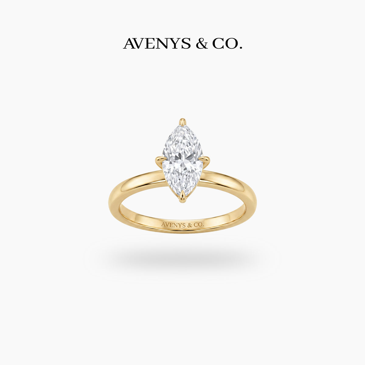 Marquis Solitaire Ring with White Marquise Stone – on Yellow Gold