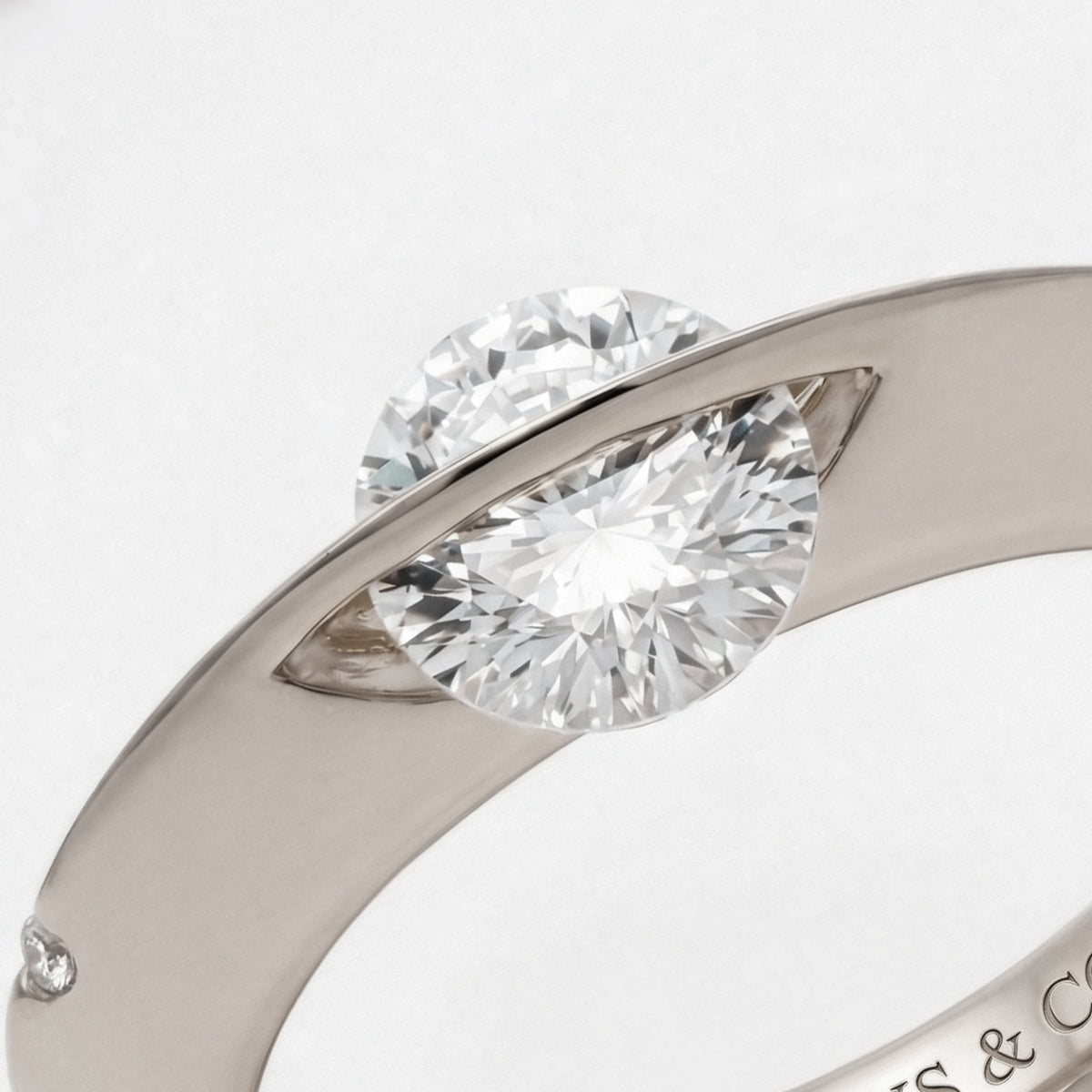 Dancing Diamonds Slim Ring with White Round Stone – on White Gold