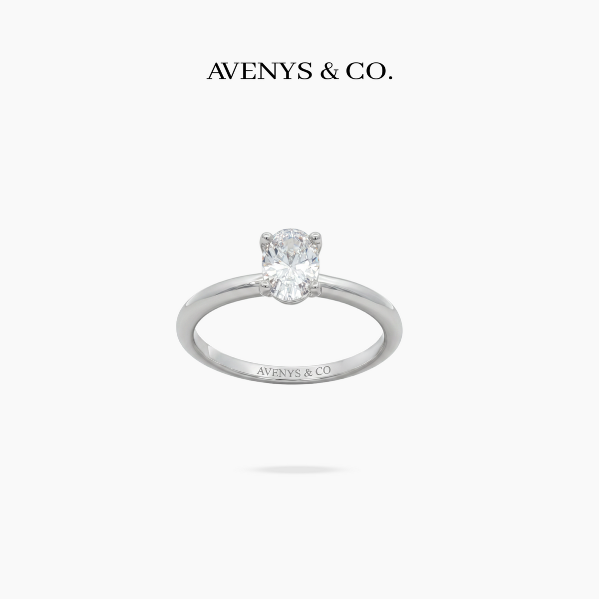 Oval Delicate Ring with White Oval Stone – on White Gold