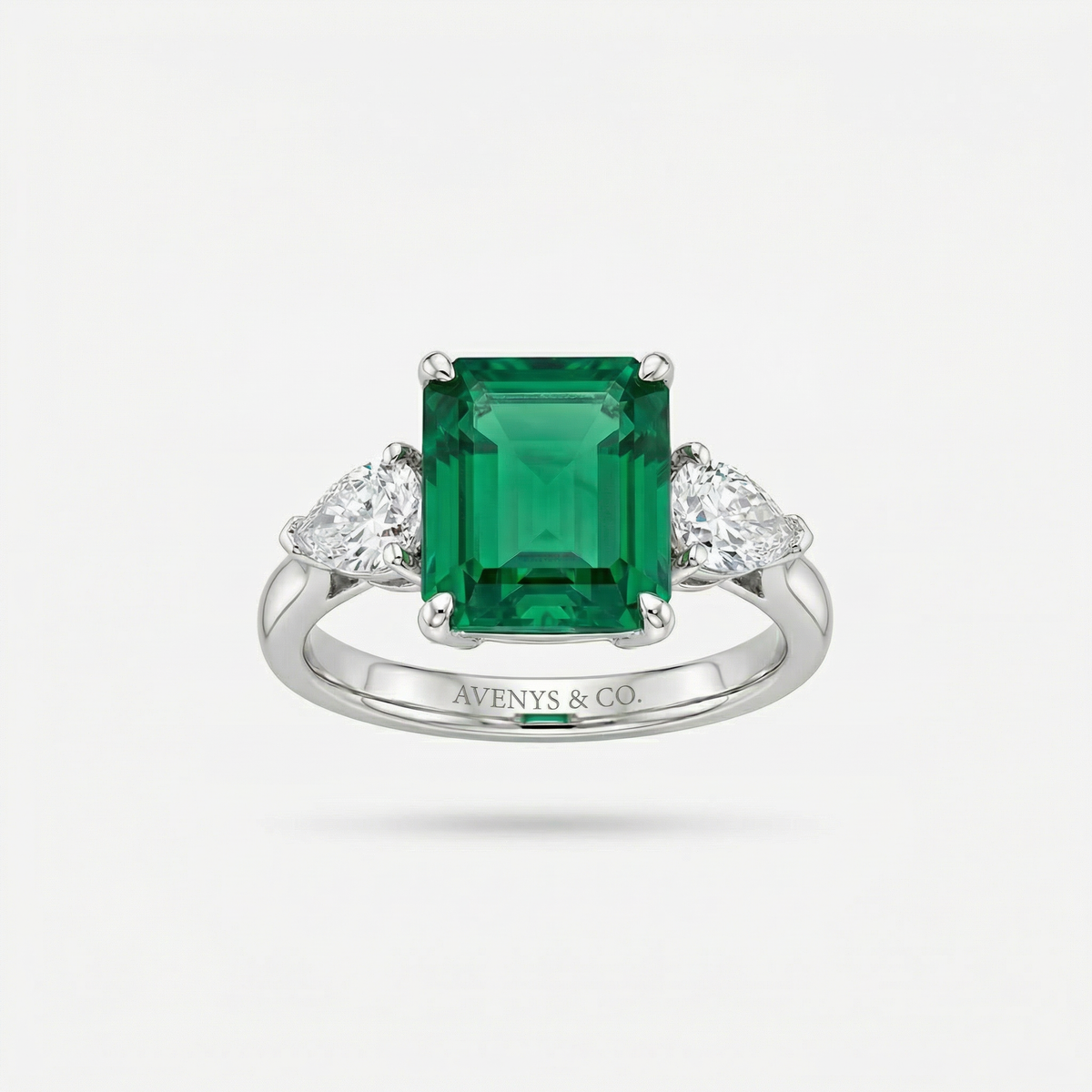 Emerald Pear Trilogy Ring with Green Emerald Stone – on White Gold