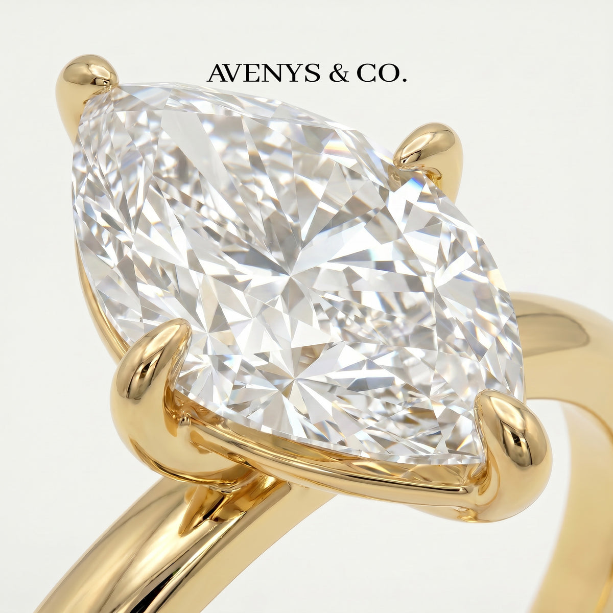 Marquis Solitaire Ring with White Marquise Stone – on Yellow Gold