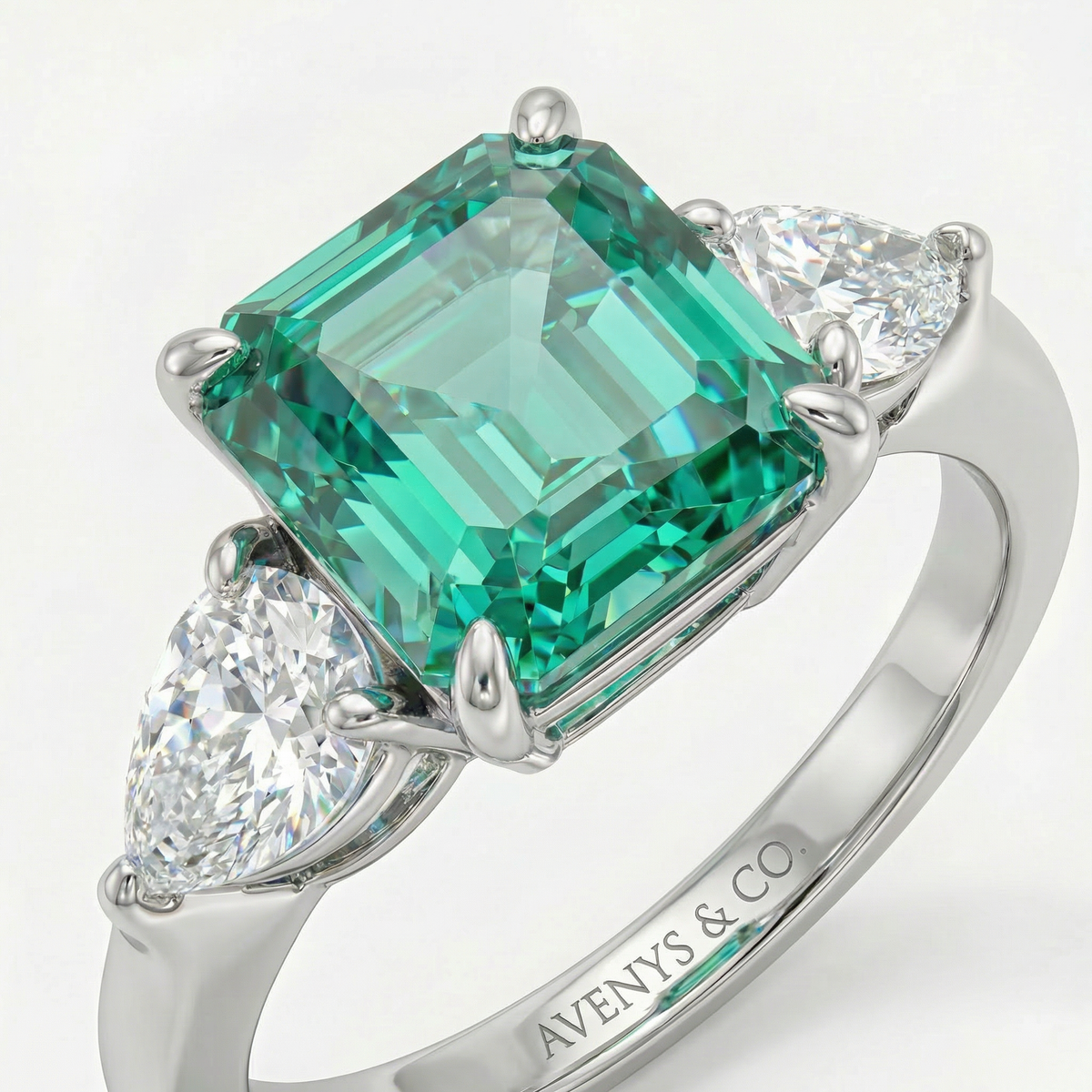 Sea Trilogy Ring with Green Pear Stone – on White Gold