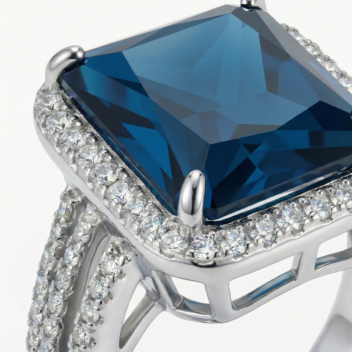 Triple Shank Radiant Ring with Blue Radiant Stone – on White Gold