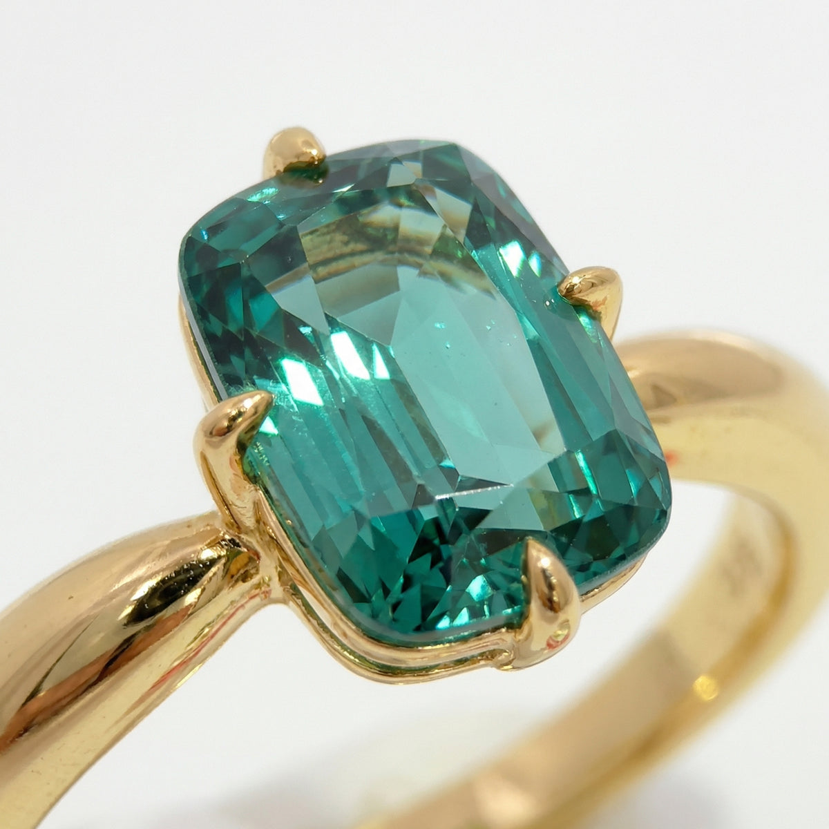 Modern Solitaire Cocktail Ring with Blue Cushion Stone – on Yellow Gold