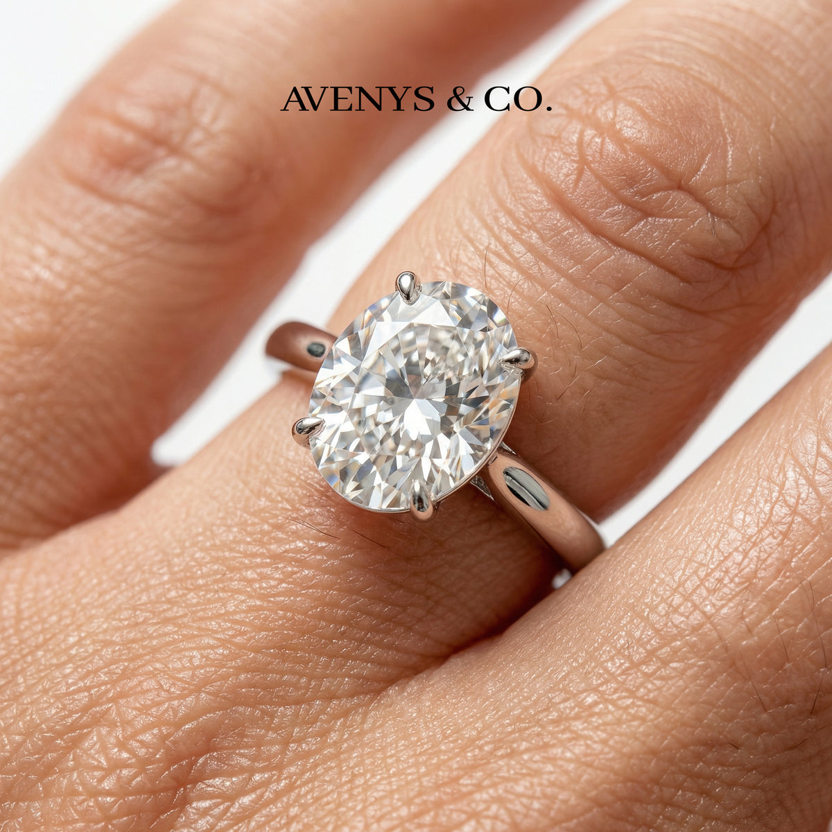 Oval Solitaire Ring with White Oval Stone – on White Gold