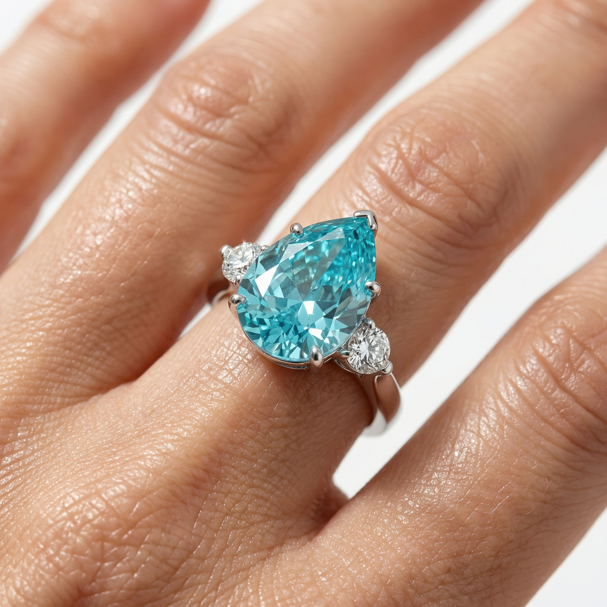 Pear Trilogy Ring with Aquamarine Pear Stone – on White Gold