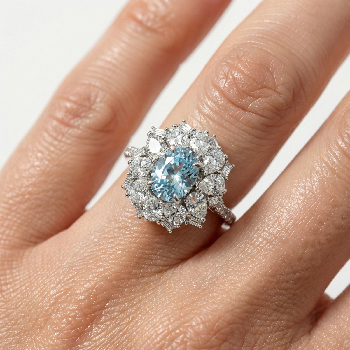Bloom Halo Ring with Blue Oval Stone – on White Gold