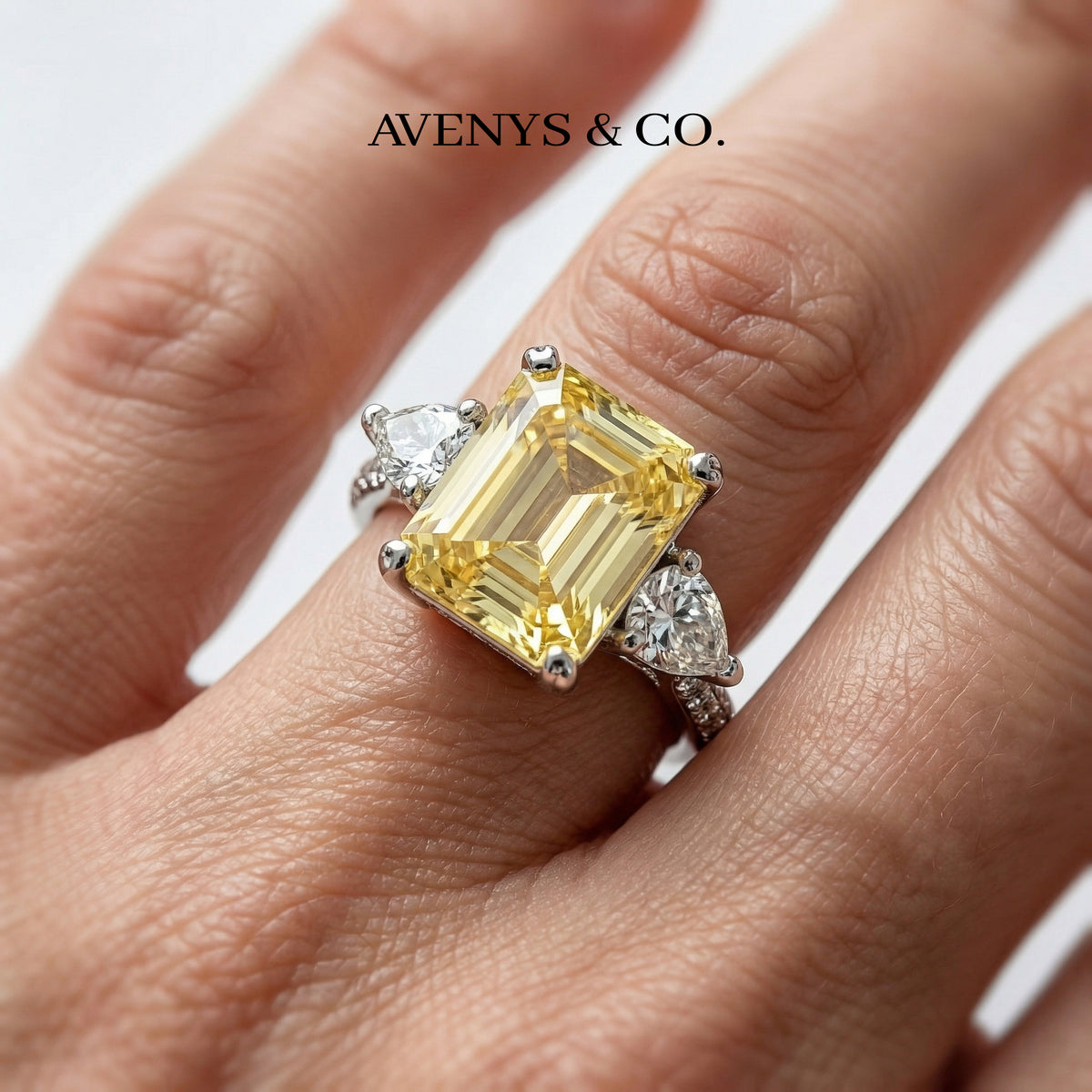 Emerald Pear Trilogy Ring with Yellow Emerald Stone – on White Gold