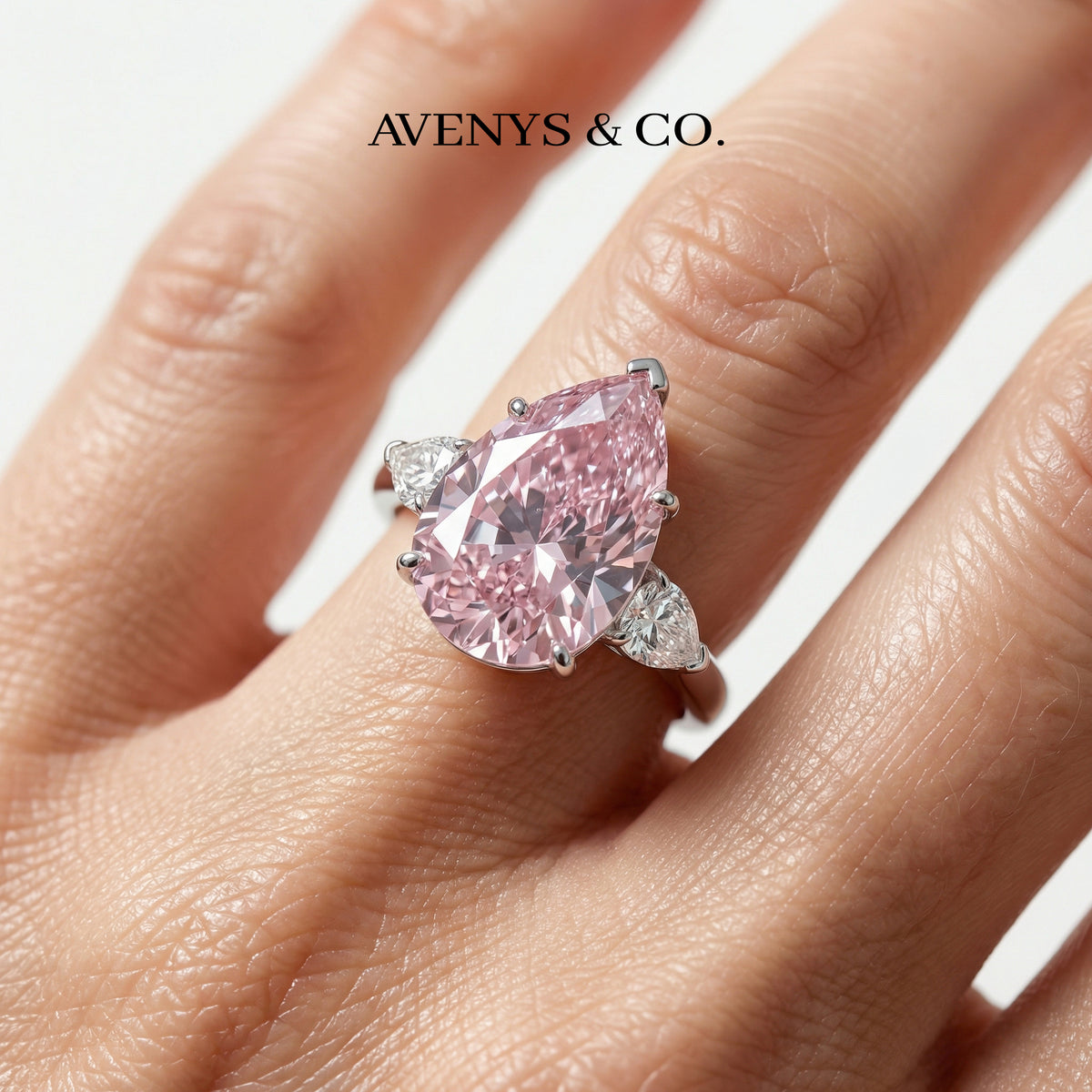 Pear Trilogy Ring with Pink Pear Stone – on White Gold