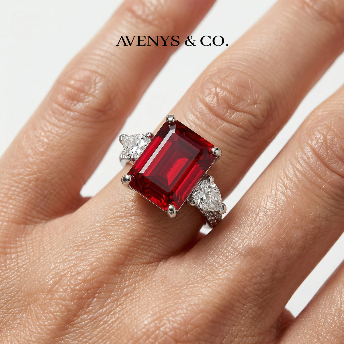 Emerald Pear Trilogy Ring with Red Emerald Stone – on White Gold