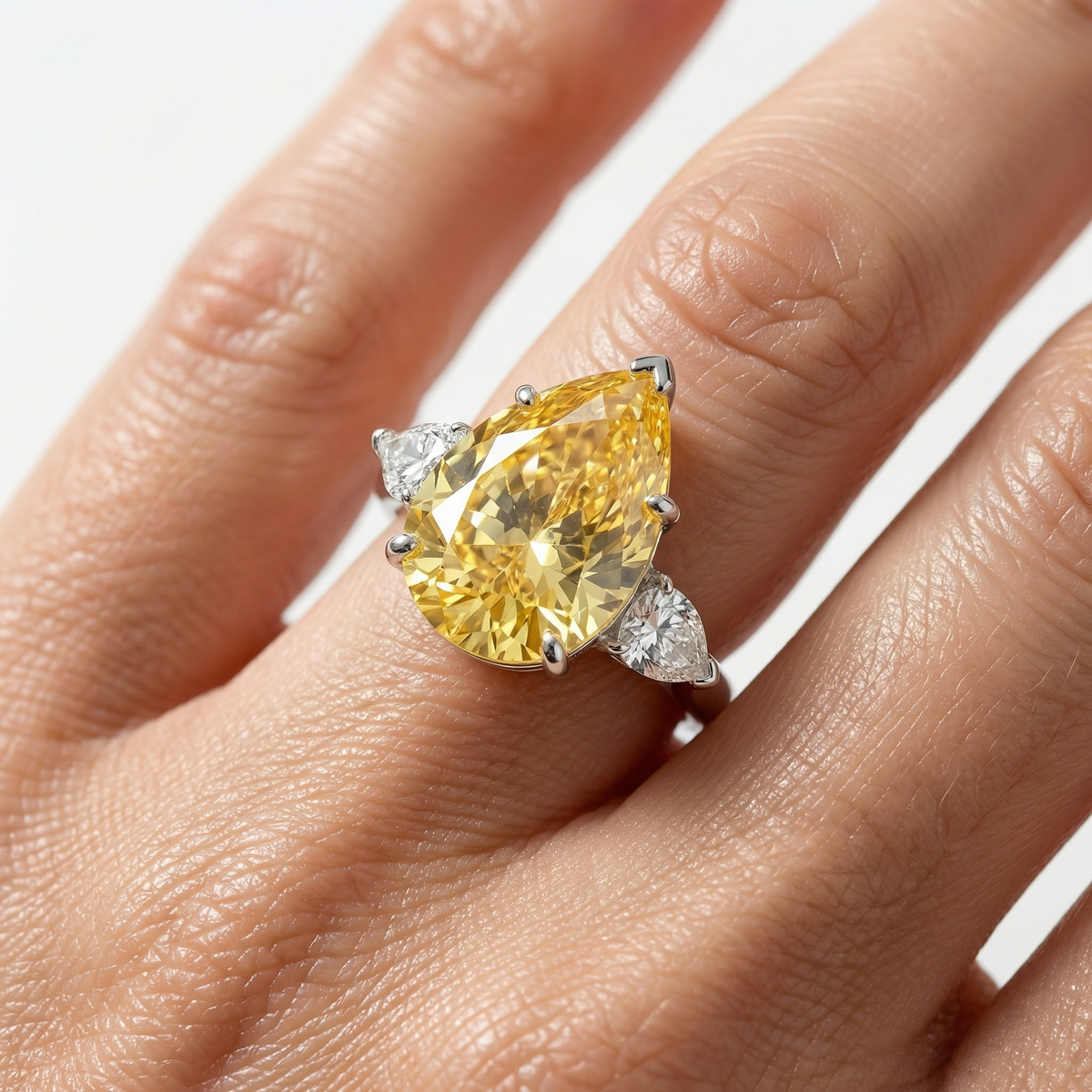 Pear Trilogy Ring with Yellow Pear Stone – on White Gold