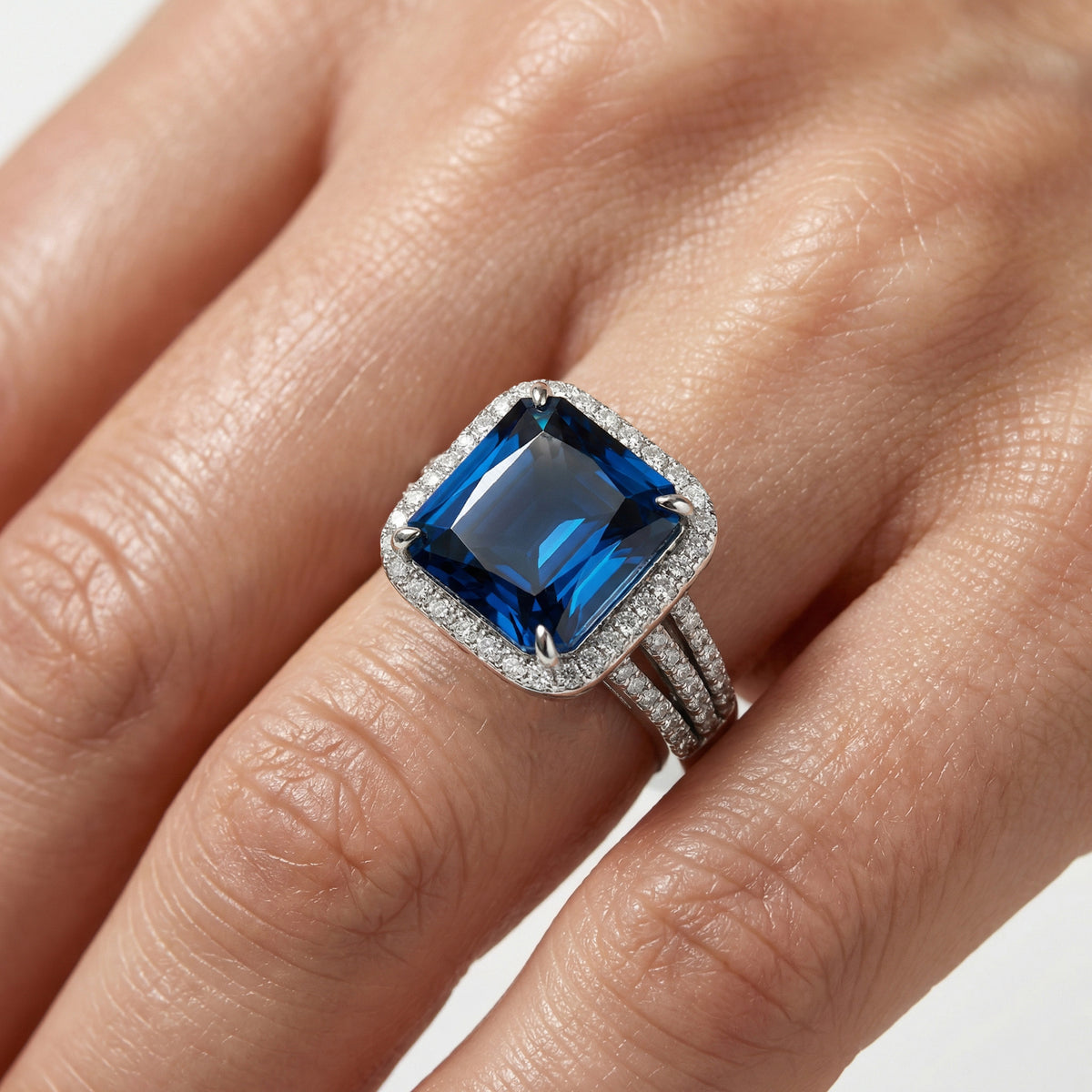 Triple Shank Radiant Ring with Blue Radiant Stone – on White Gold