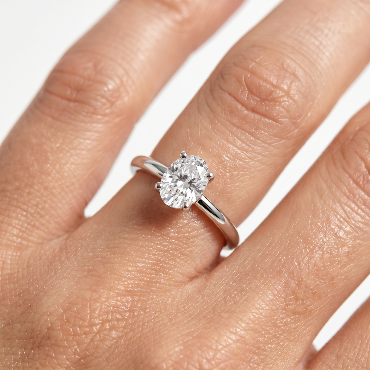 Oval Delicate Ring with White Oval Stone – on White Gold