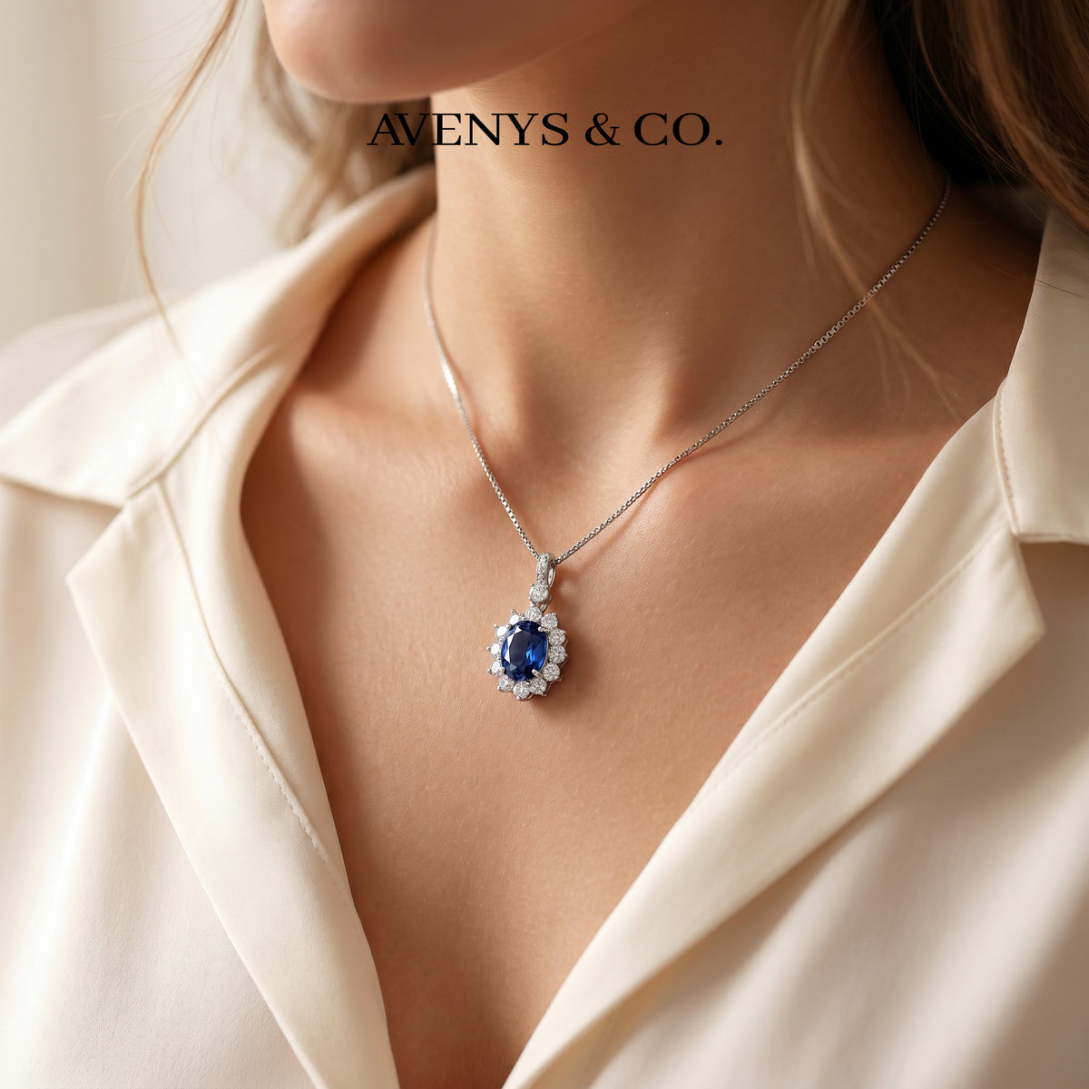 Classic Halo Necklace with Blue Oval Stone – on White Gold