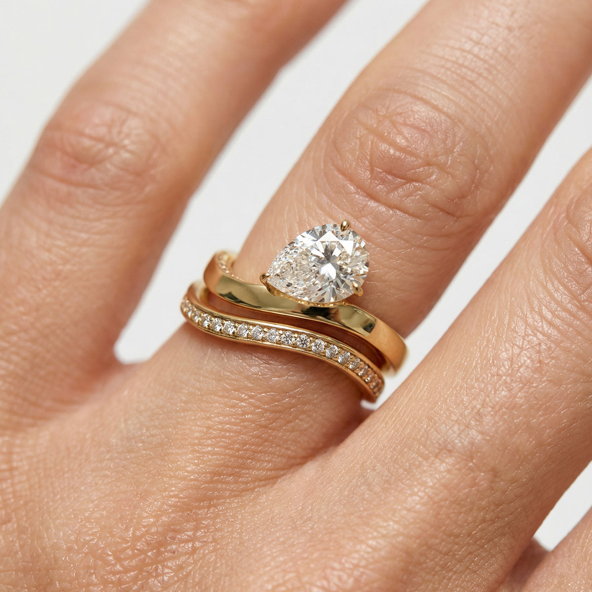 Wave Pave Double Ring with White Pear Stone – on Yellow Gold