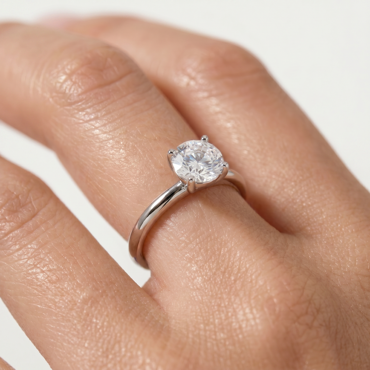 Round Delicate Ring with White Round Stone – on White Gold
