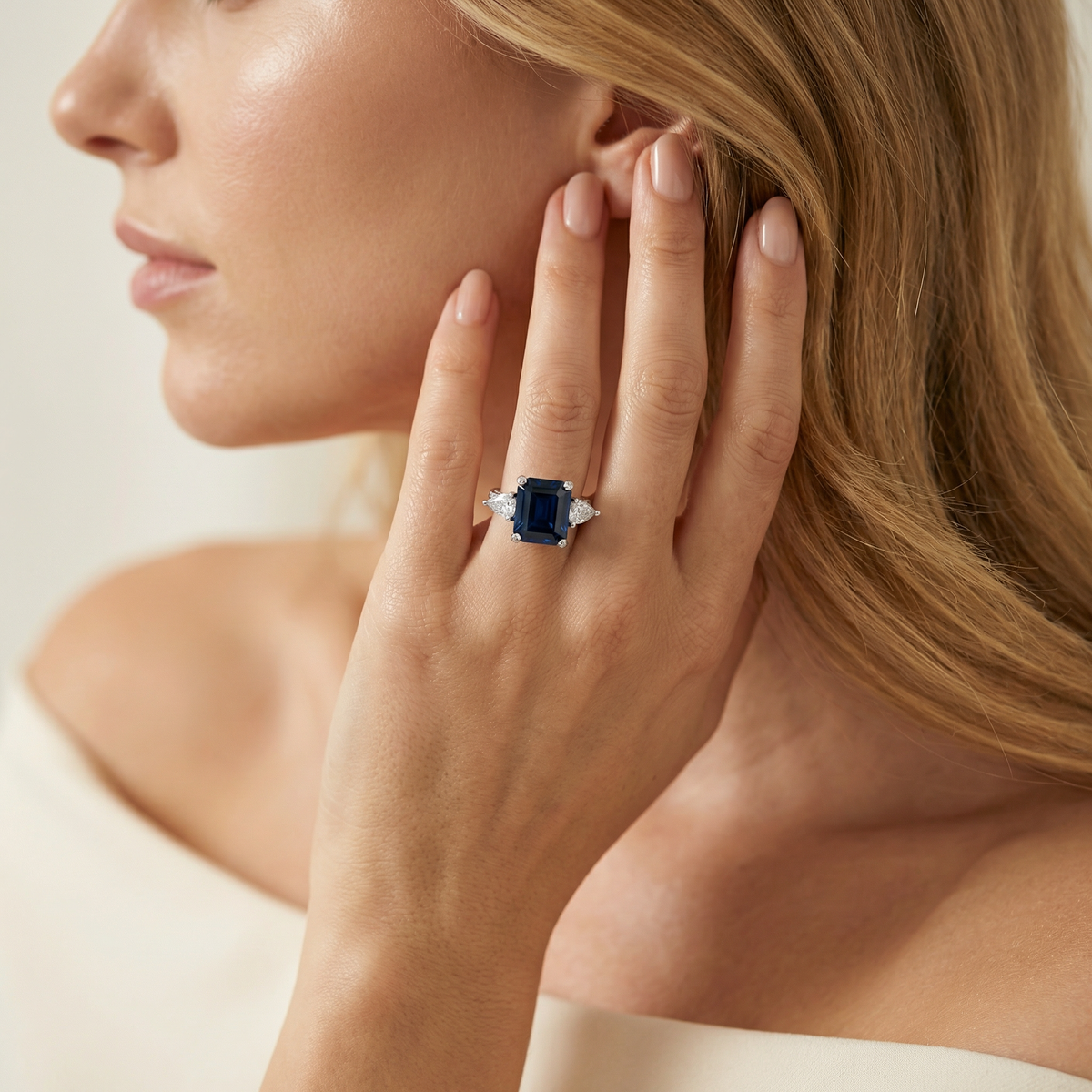 Emerald Pear Trilogy Ring with Blue Emerald Stone – on White Gold