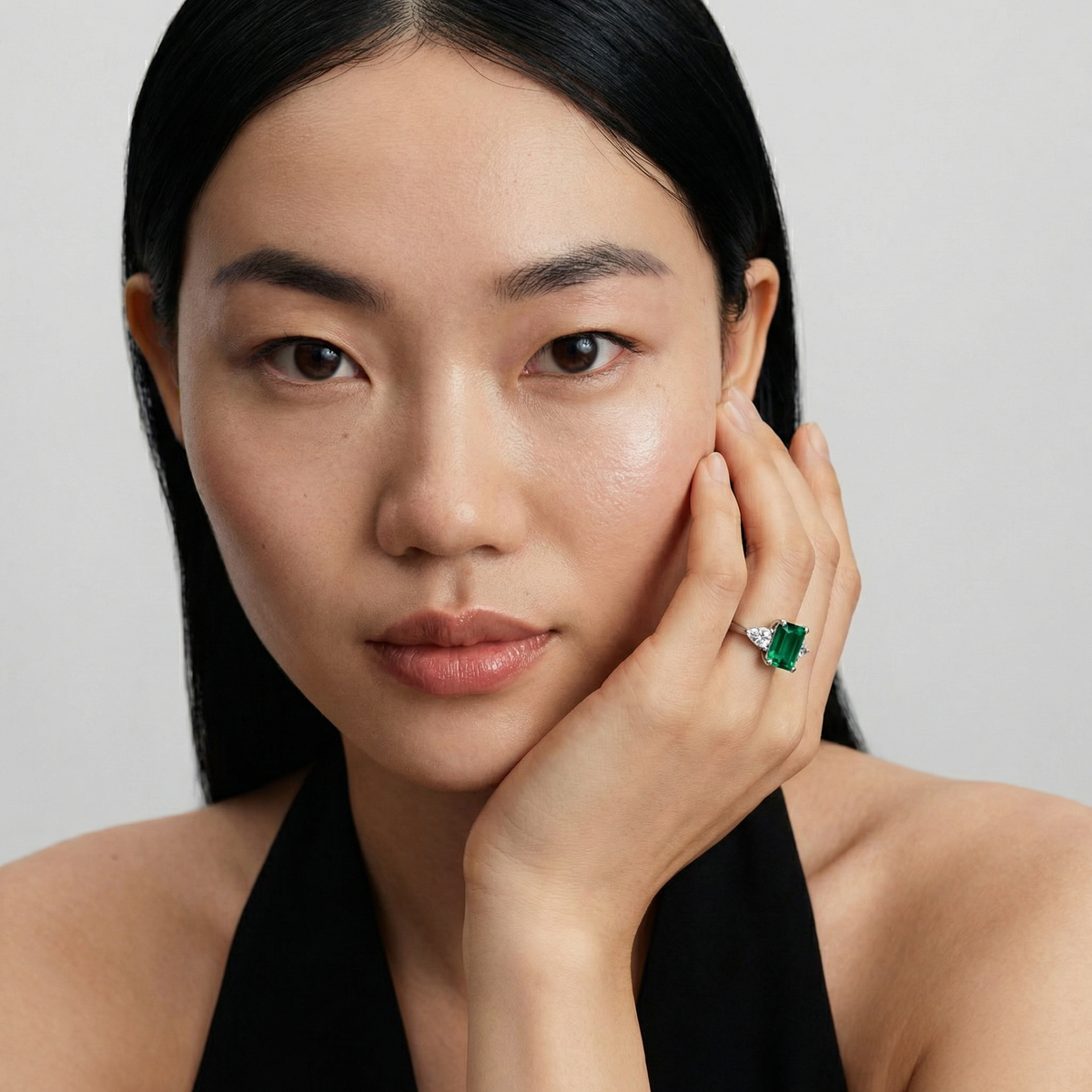 Emerald Pear Trilogy Ring with Green Emerald Stone – on White Gold