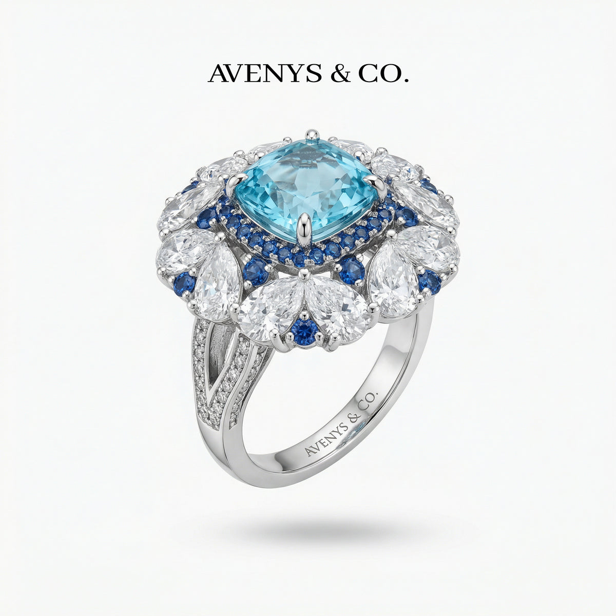 Royal Flower Halo Ring with Blue Cushion Stone – on White Gold