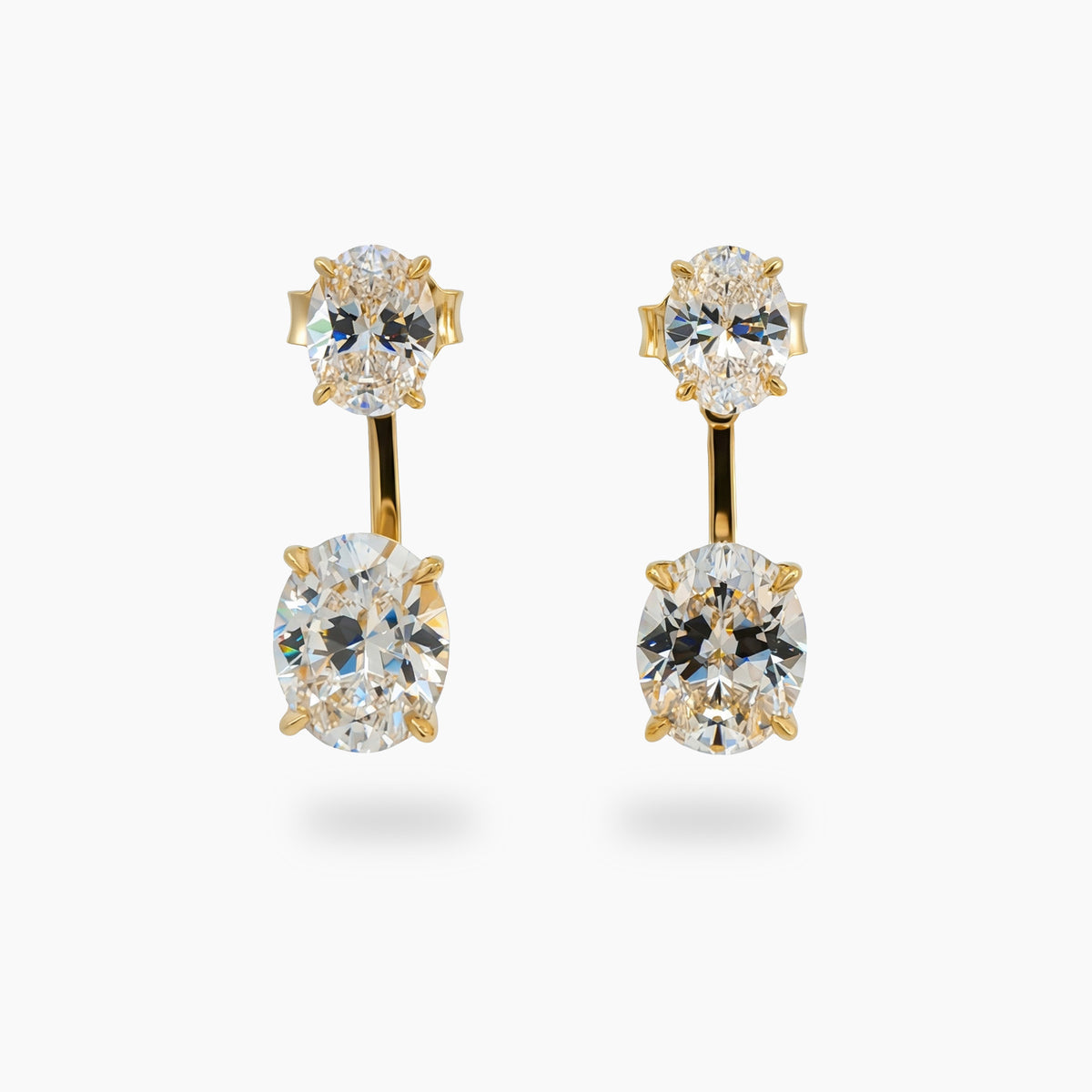 Air Drop Earrings with White Oval Stone – on Yellow Gold