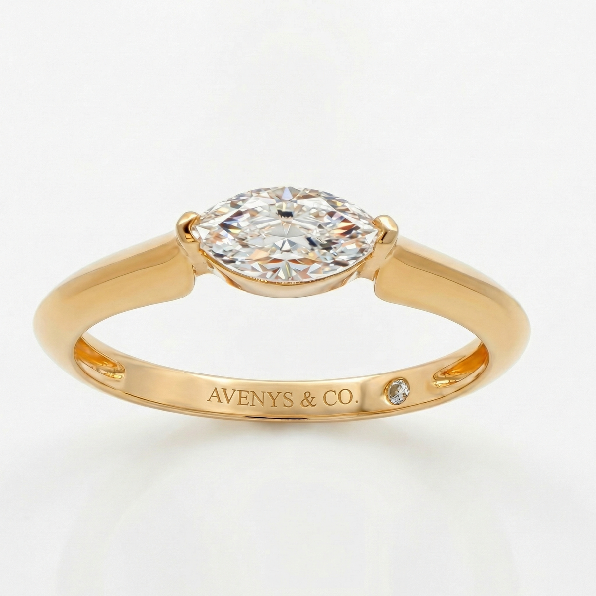 Delicate Bezel Ring with White Marquise Stone – on Yellow Gold
