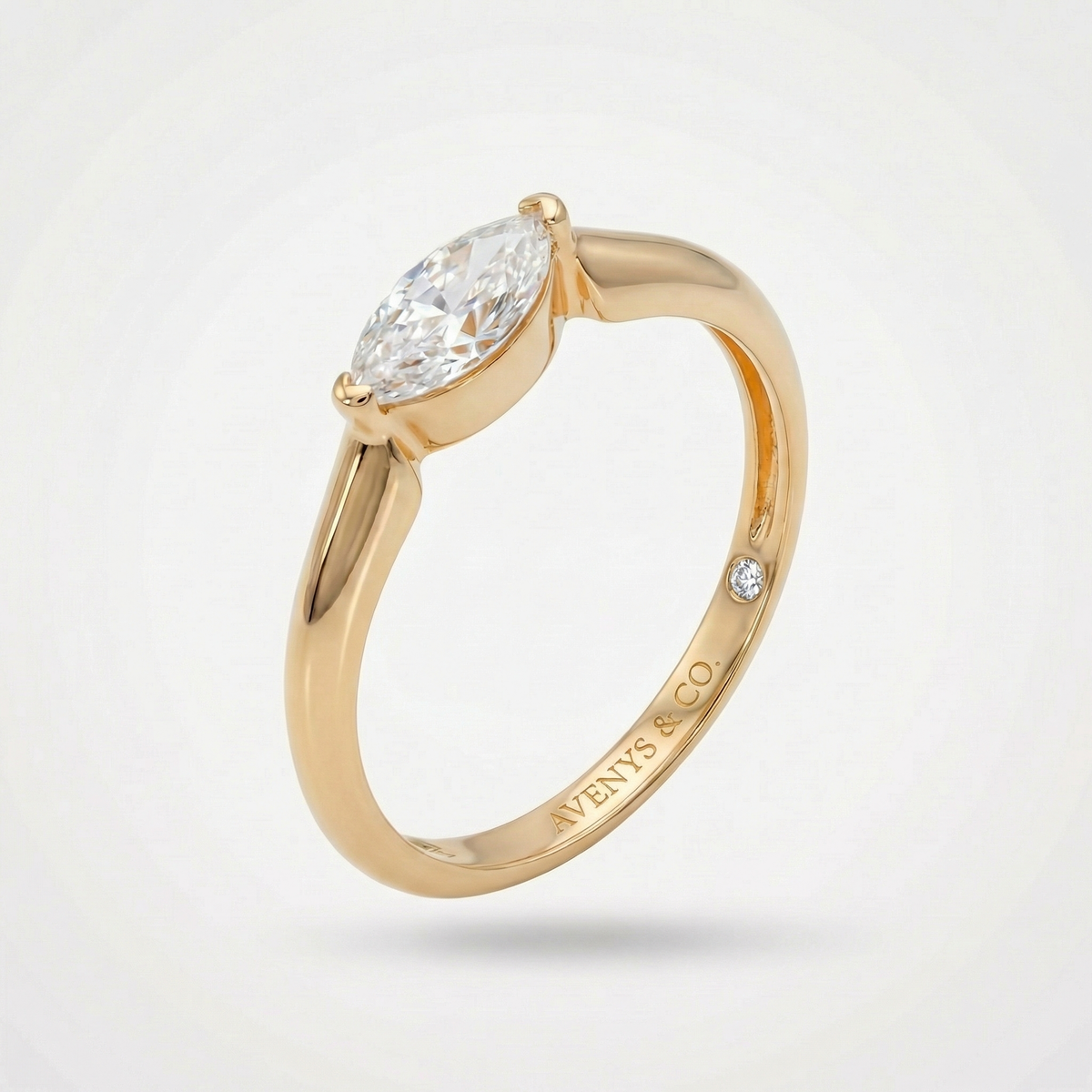 Delicate Bezel Ring with White Marquise Stone – on Yellow Gold