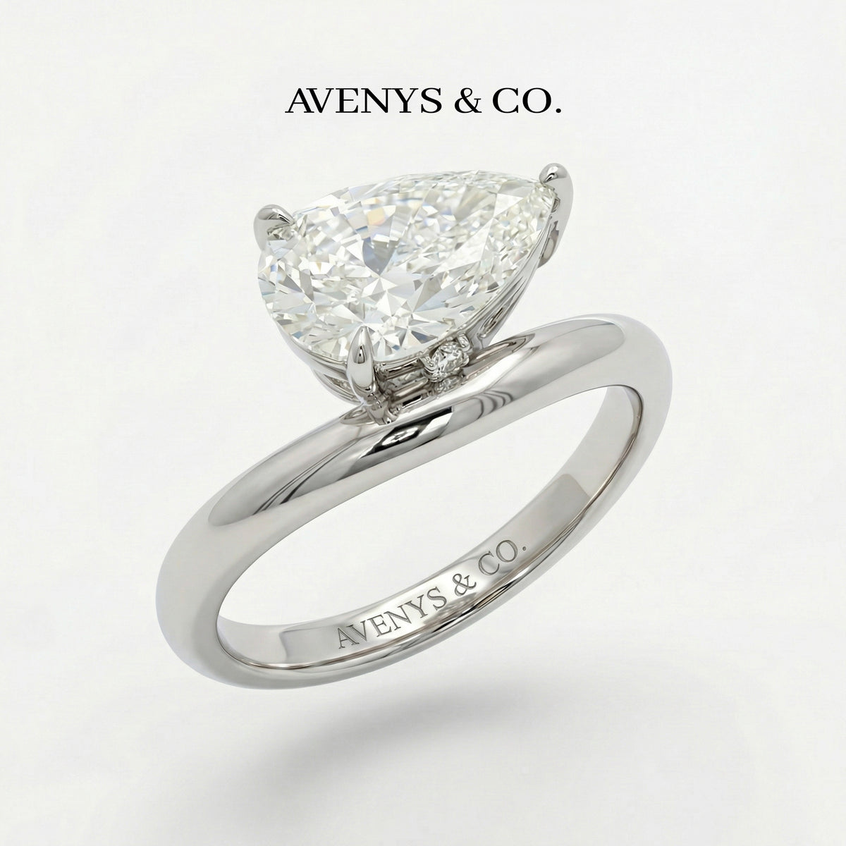Wave Solitaire Ring with White Pear Stone – on White Gold