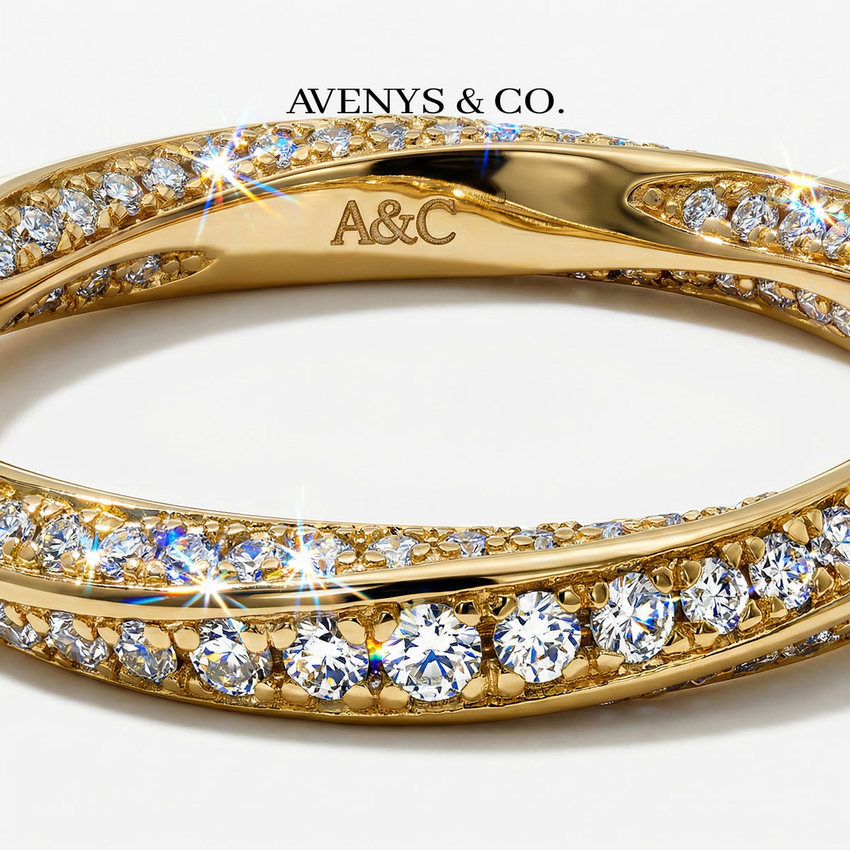 Spiral Ring with White Round Stone – on Yellow Gold