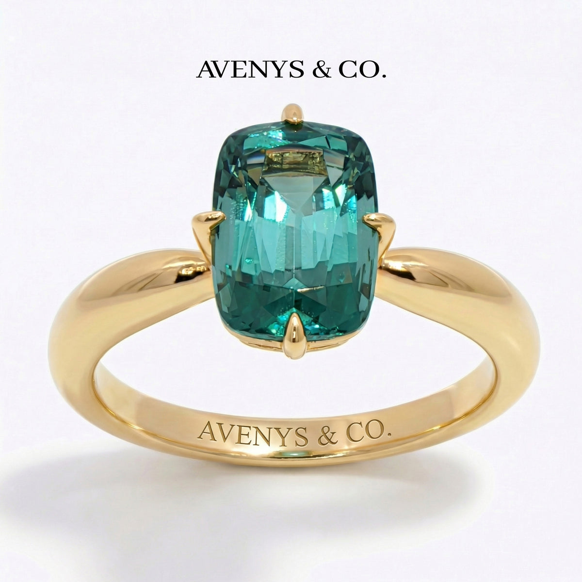 Modern Solitaire Cocktail Ring with Blue Cushion Stone – on Yellow Gold