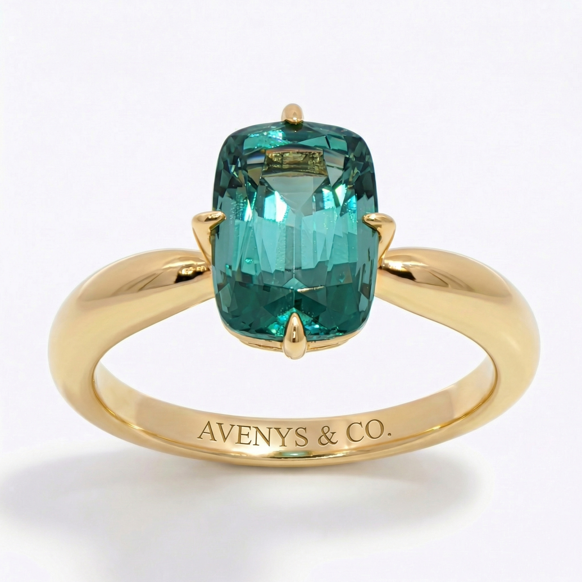 Modern Solitaire Cocktail Ring with Blue Cushion Stone – on Yellow Gold
