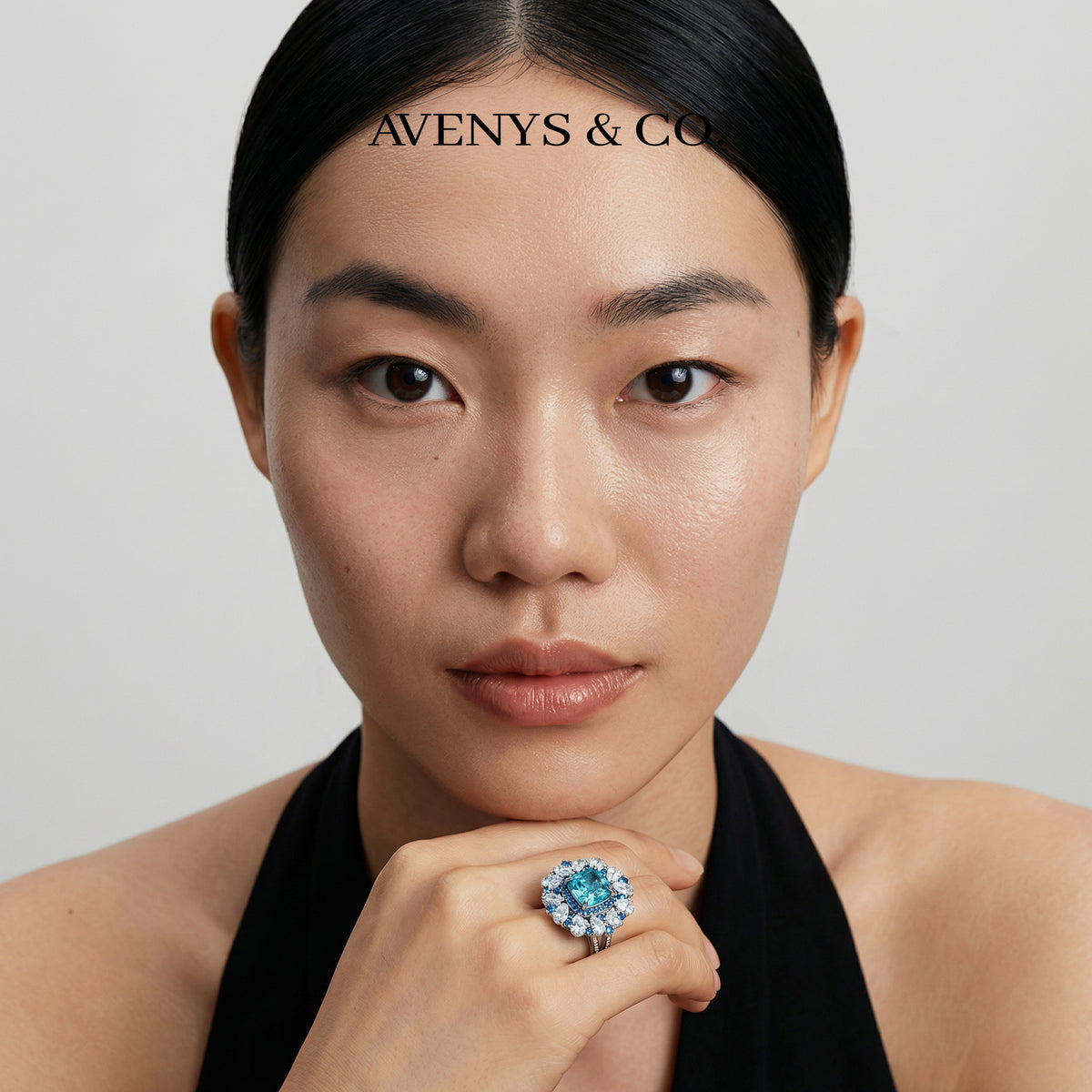 Royal Flower Halo Ring with Blue Cushion Stone – on White Gold
