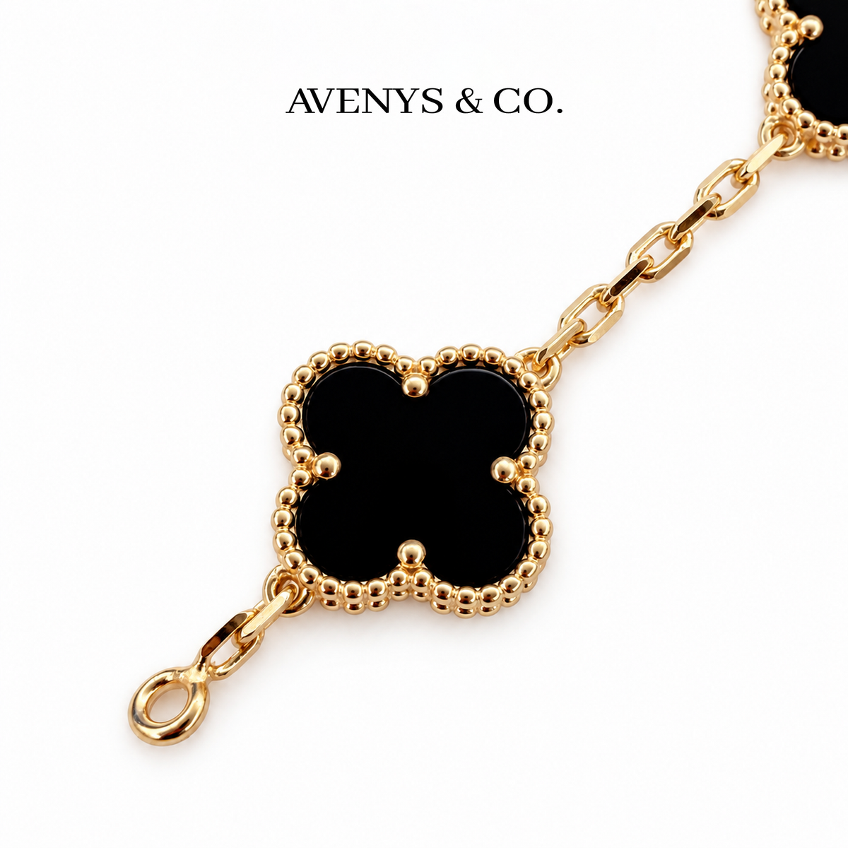 Black end motif, terminal ring and faceted chain detail