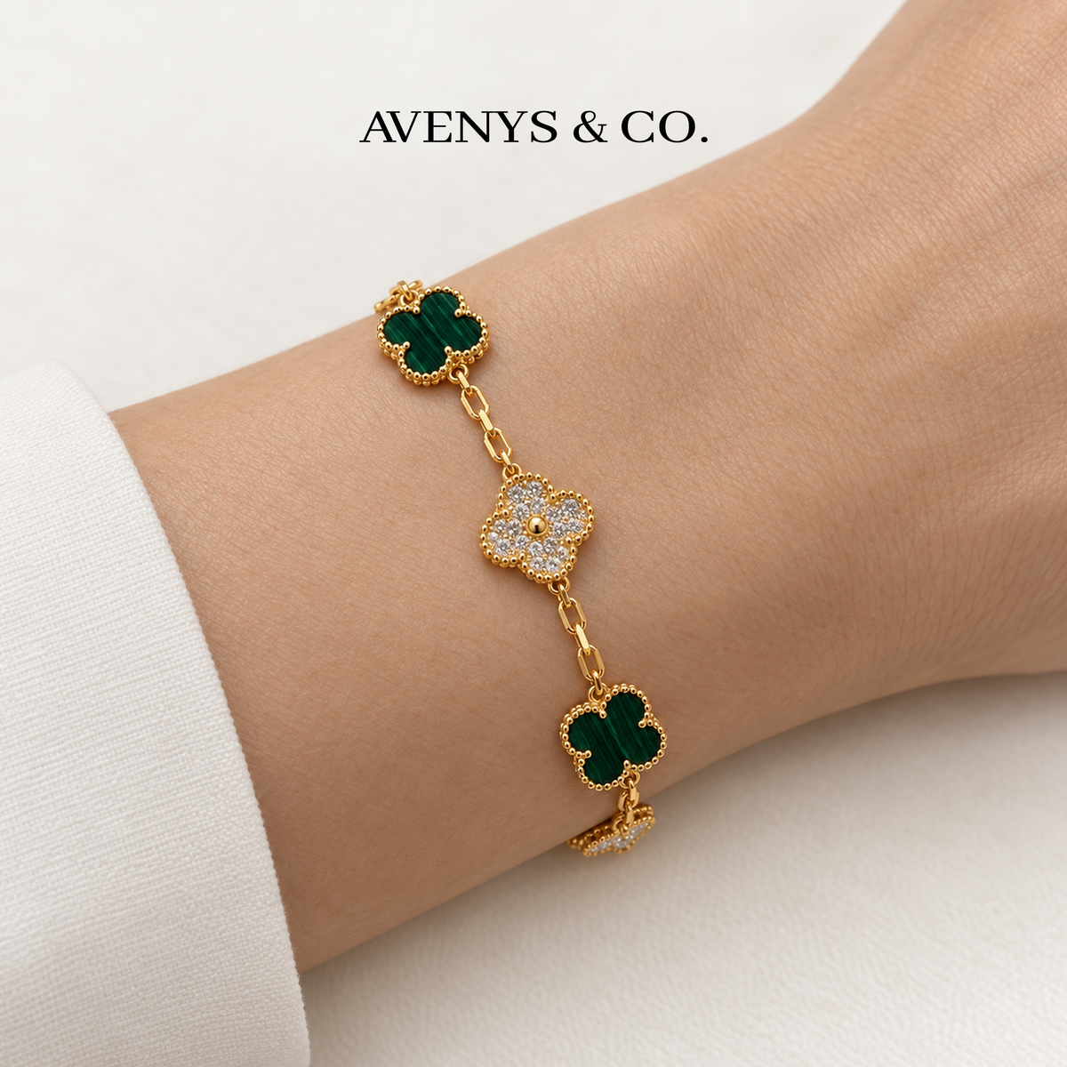 Green malachite and Diamond Burst bracelet worn on a wrist