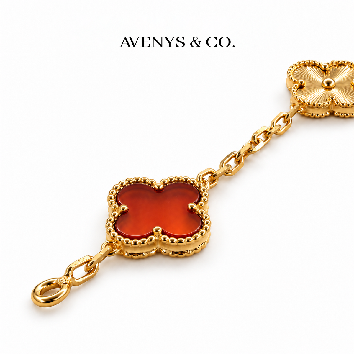 Translucent red stone, beaded border and original terminal ring