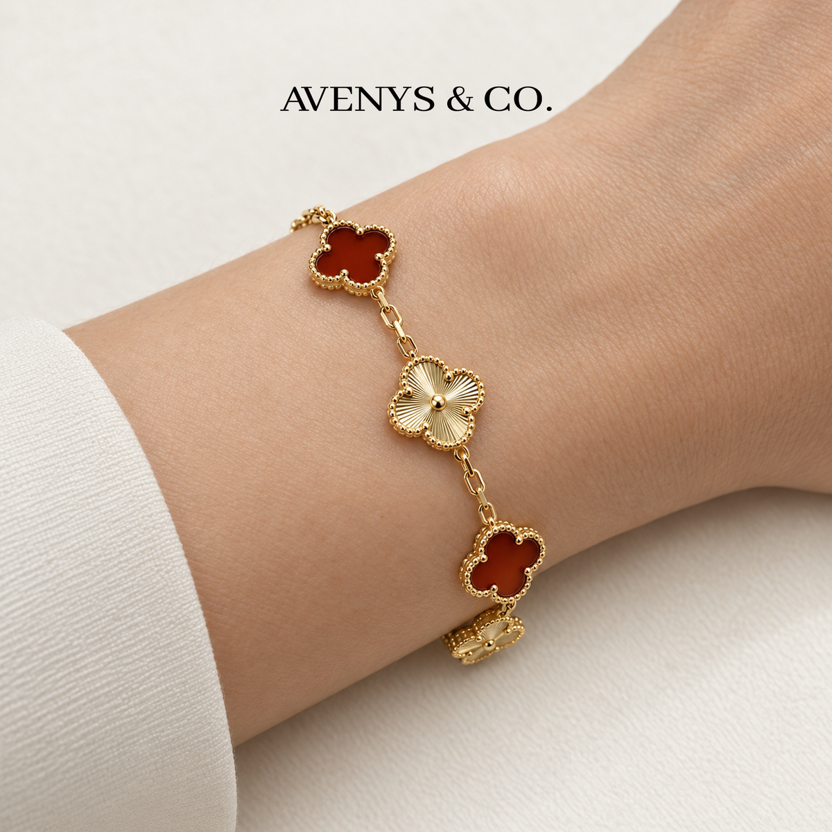 Red and Gold Sunburst bracelet worn on a wrist