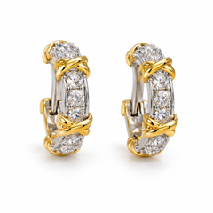 Slim white-stone hoop earrings in silver tone with yellow-gold crossed wrap accents on a white background.